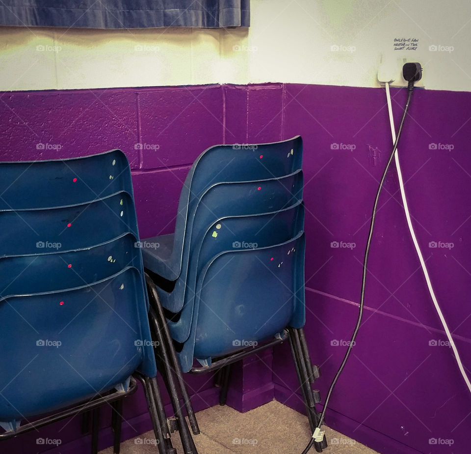 Chairs in a purple room