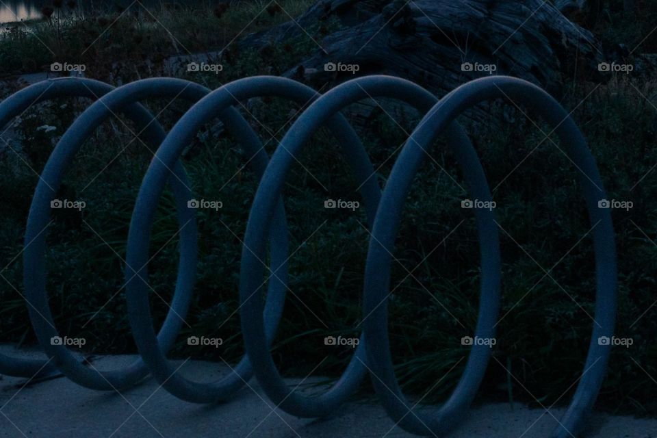 Night shots at the beach started after a too cloudy night to observe the moon. This is a shot of a bicycle rack used to frame some other shots. Manual mode, wide aperture and super slow shutter speed soaking in as much light as possible! 