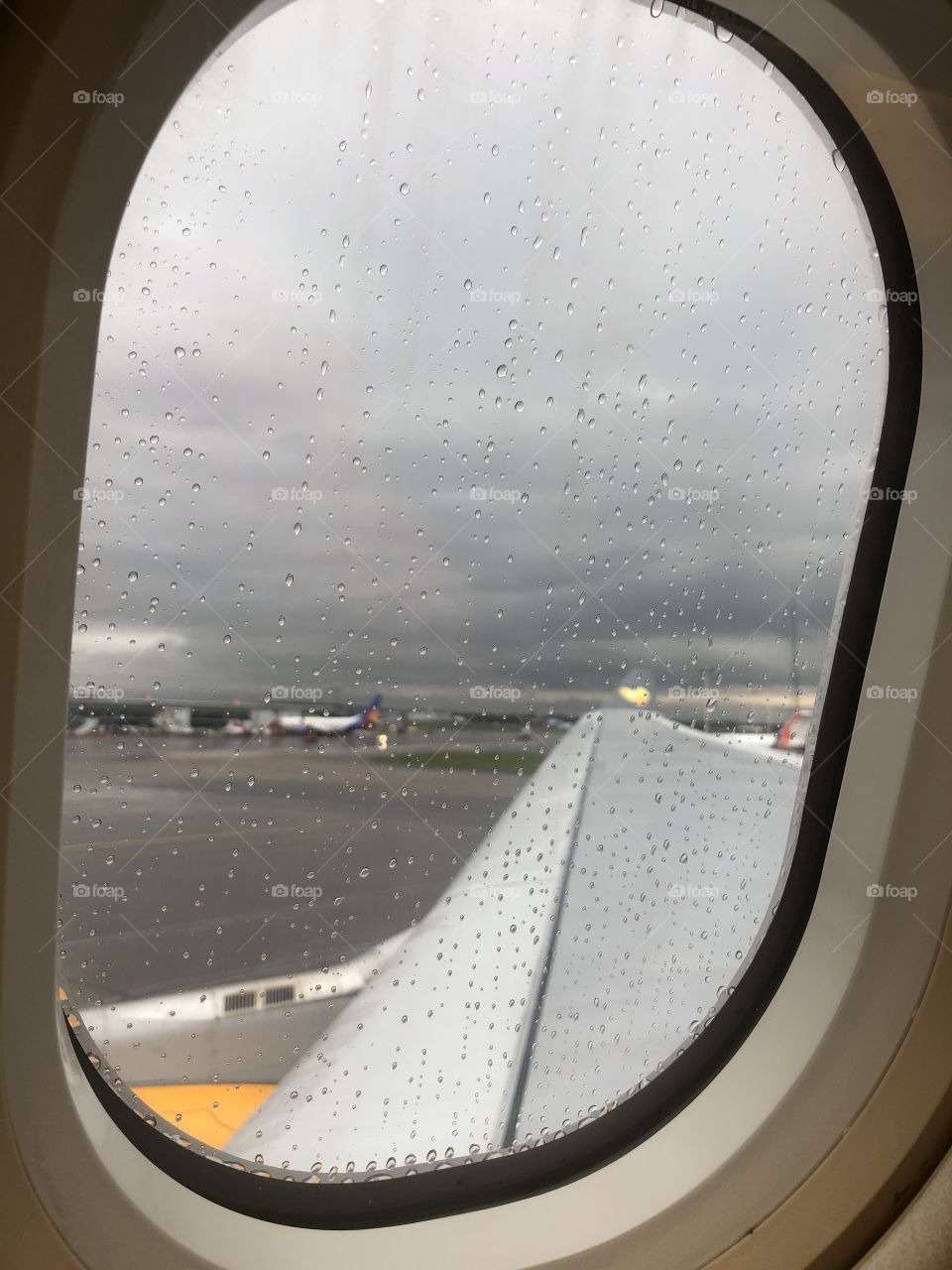Rain On A Plane Window... Ready To Fly Towards The Sunshine 