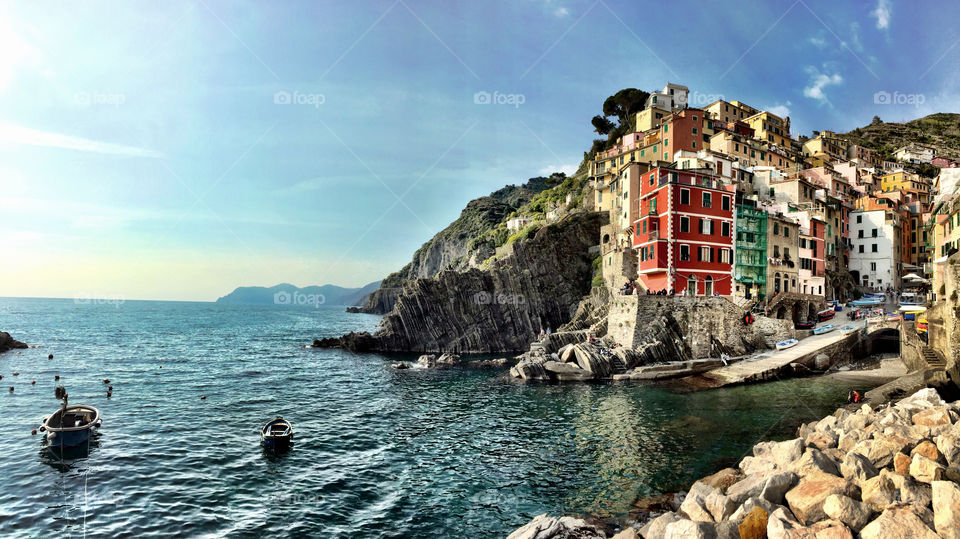 Harbour and medieval houses in steep ravine, riomaggiore