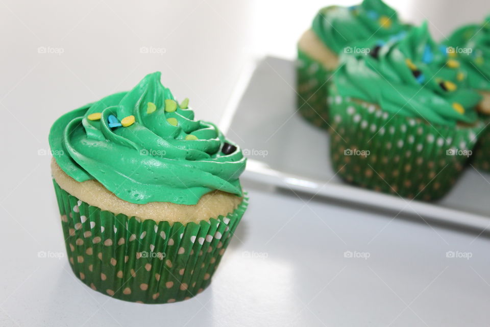 White Cupcakes with Green Buttercream Frosting 