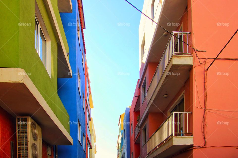 Colorful houses in a row in a narrow alley