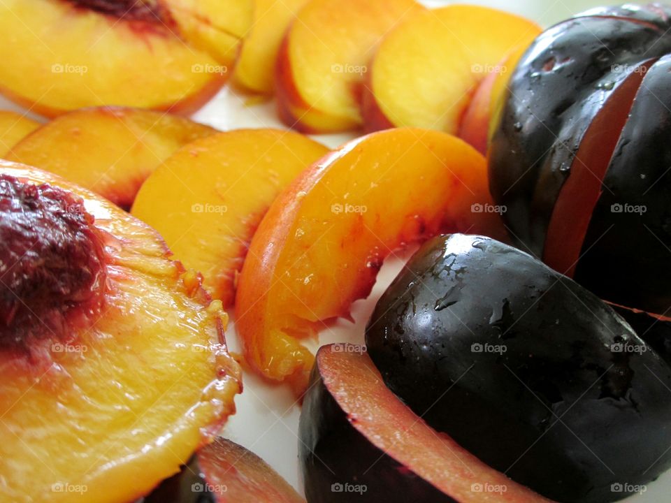 Slice of plum with peach