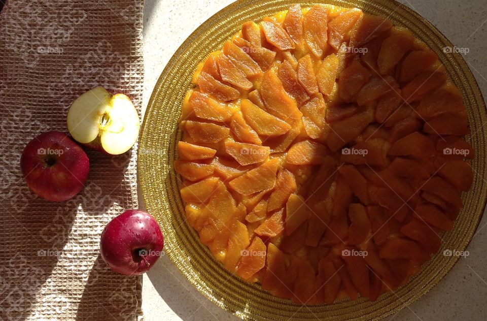 Apple tart, half at sunlight, half in shadow