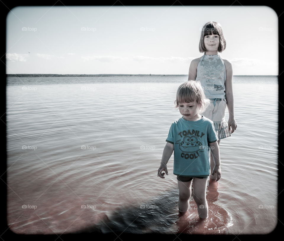Kids on the lake's beach