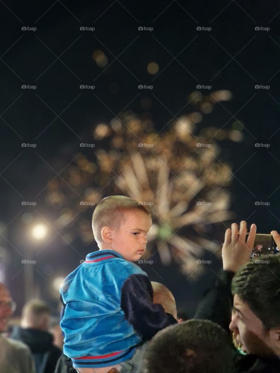 sleepy child at the fireworks