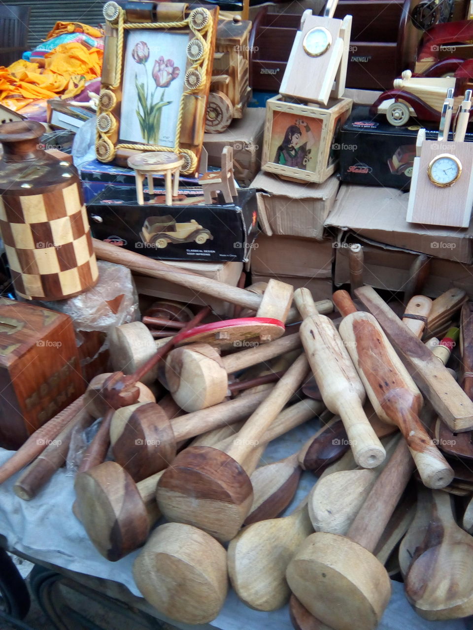Different kinds of wooden things in market of Bathinda city.