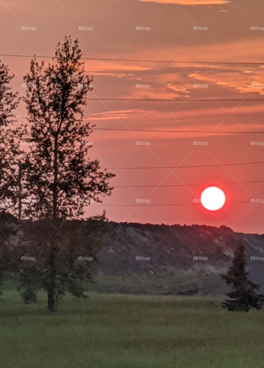 Sunset over the hill