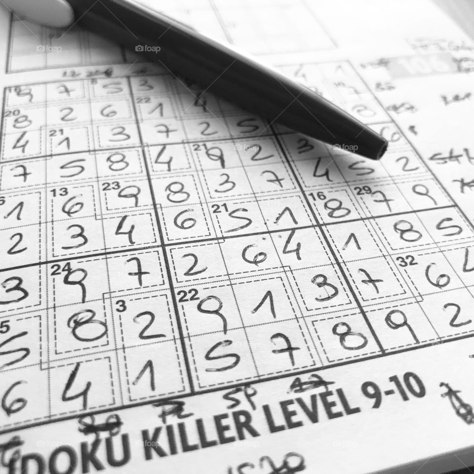 Solved high difficulty level sudoku in black and white