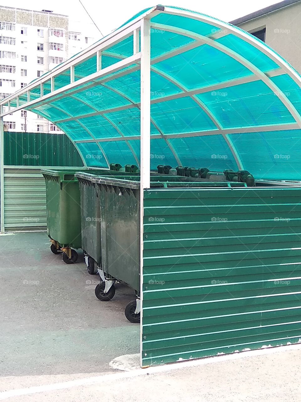 Three garbage bins on a special site