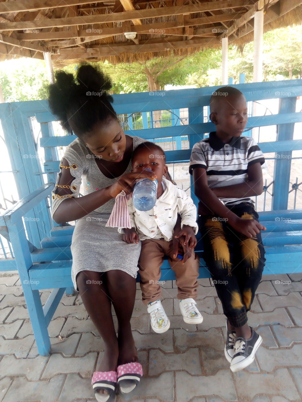 children's outing, drinking water after going round the Park.