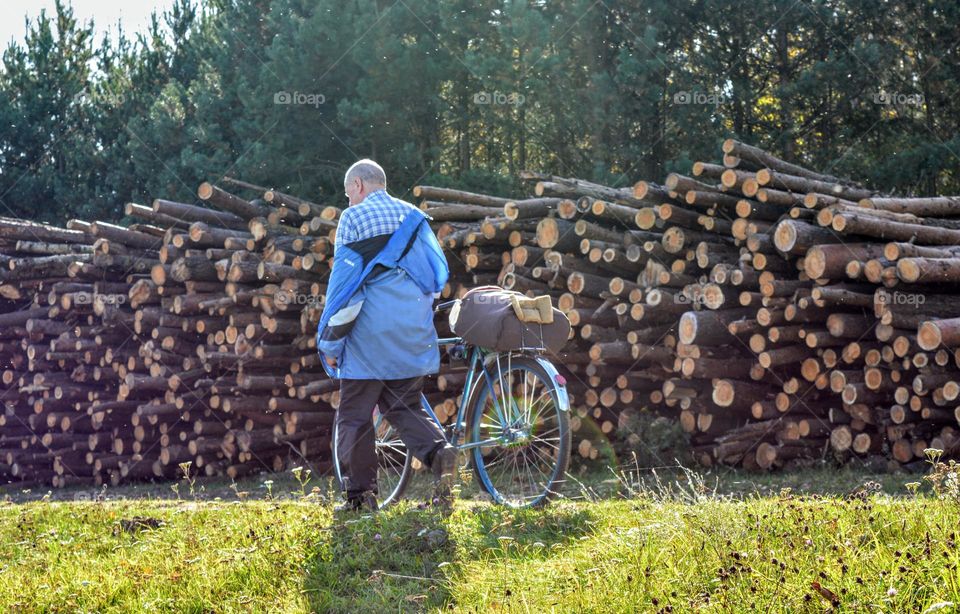 men walking with bike