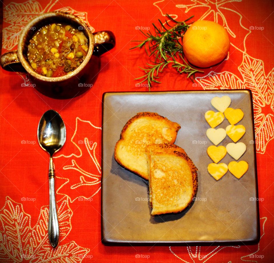 Hot soup and sandwich with cheese 