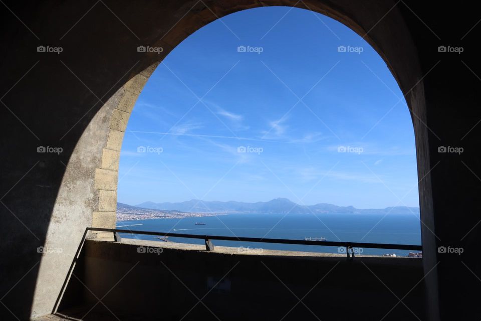 Arch window with view of Napoli bay