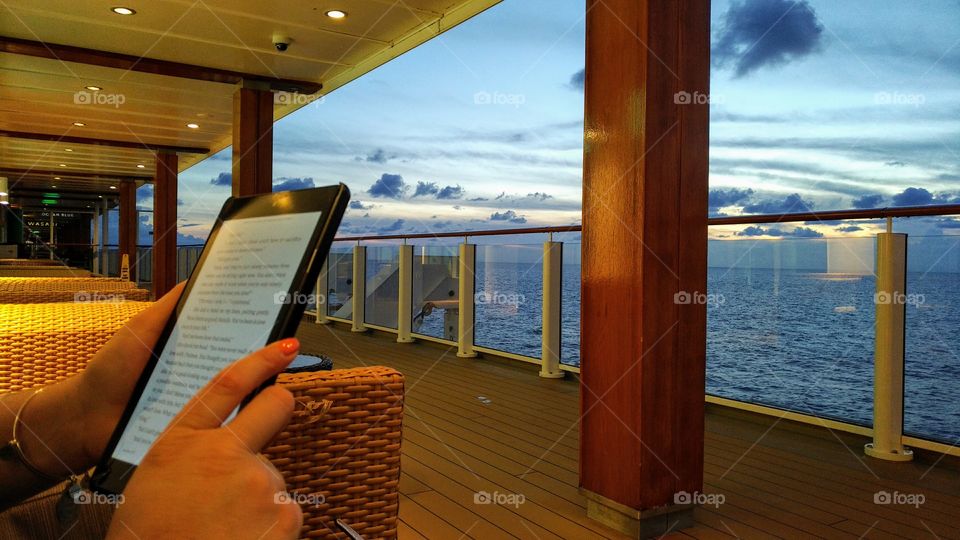 Reading on the Deck of a Cruise Ship