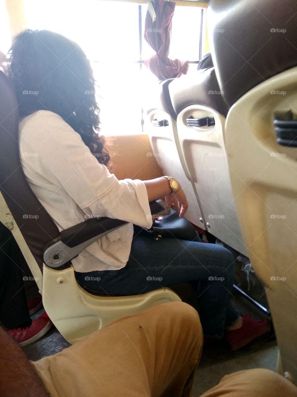 a lady sit on the seat