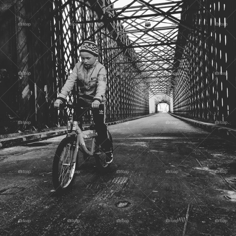 Small child riding on bicycle