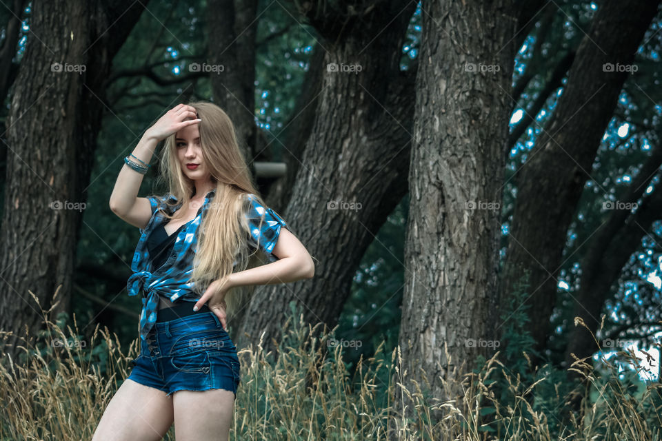 A girl with blond hair in a plaid shirt and short denim shorts on a background of trees and nature
Girl, woman, people, blonde, blonde hair, checkered shirt, shorts shorts, denim shorts, forest, nature, trees, grass, feelings, emotions, tenderness, love, lifestyle, lifestyle, recreation