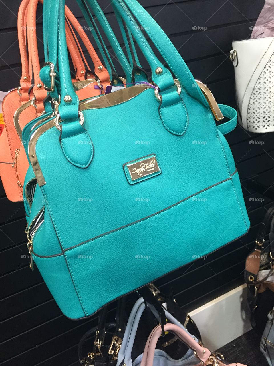 Teal colored handbag