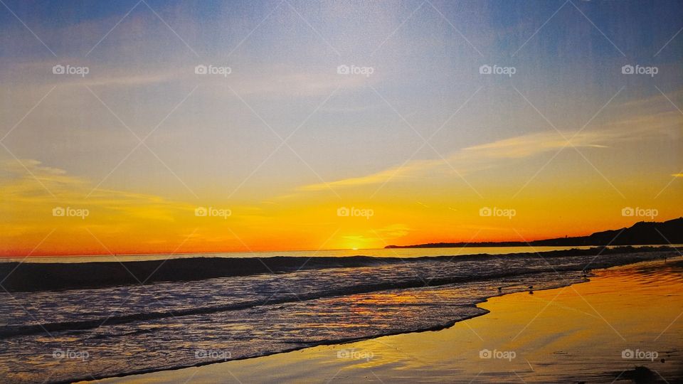 Walking along the beach near our hotel