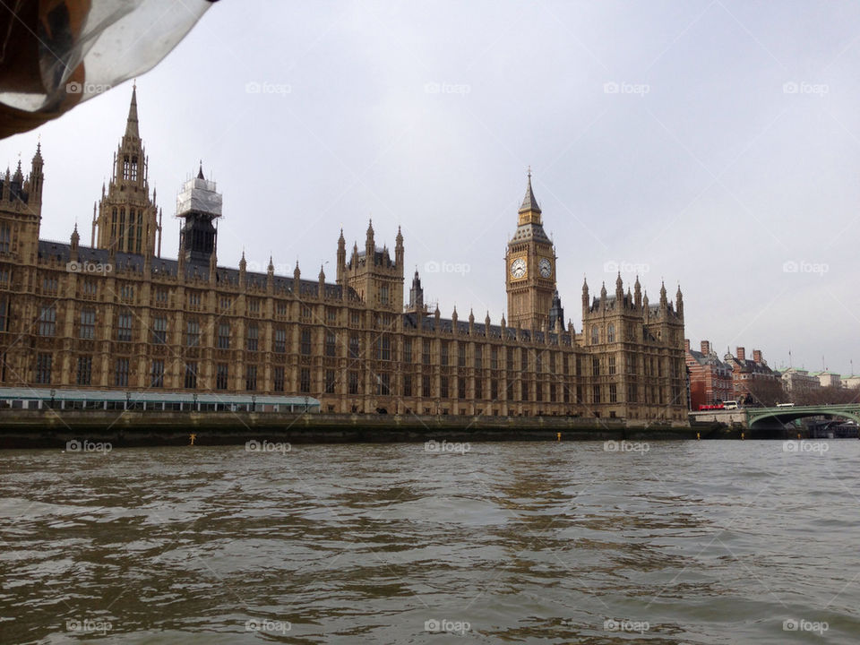 The Houses of Parliament viewed from a boat on the Thames