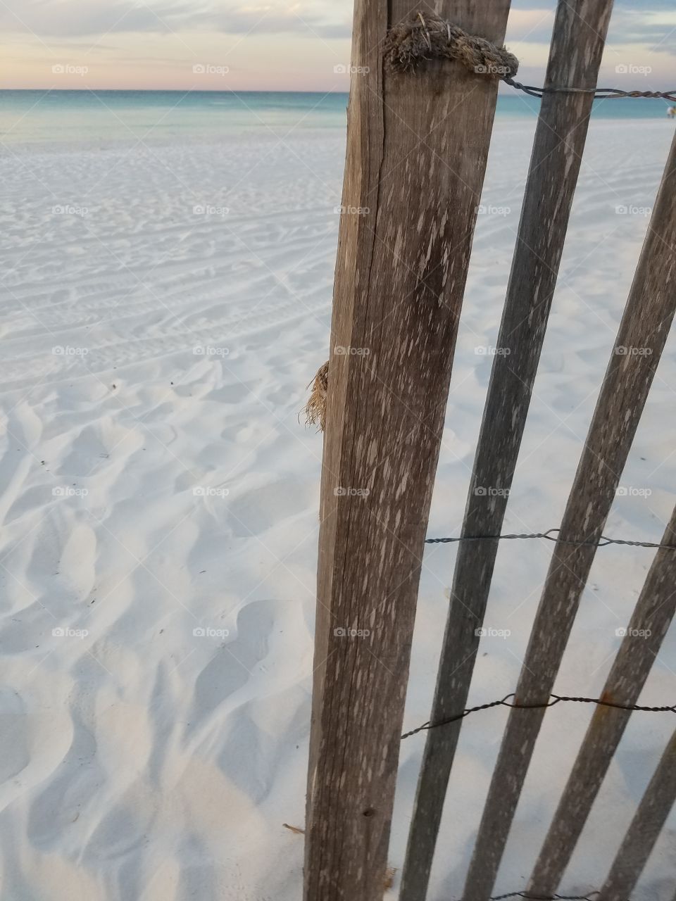 wooden slat fence at sand dunes