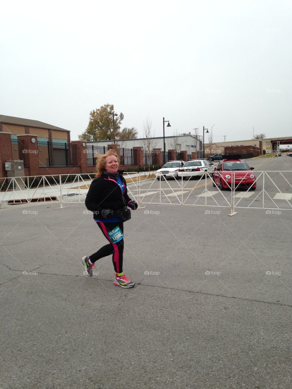 Running the Route 66 Marathon. It was bitterly cold that day, but still smiling!!!