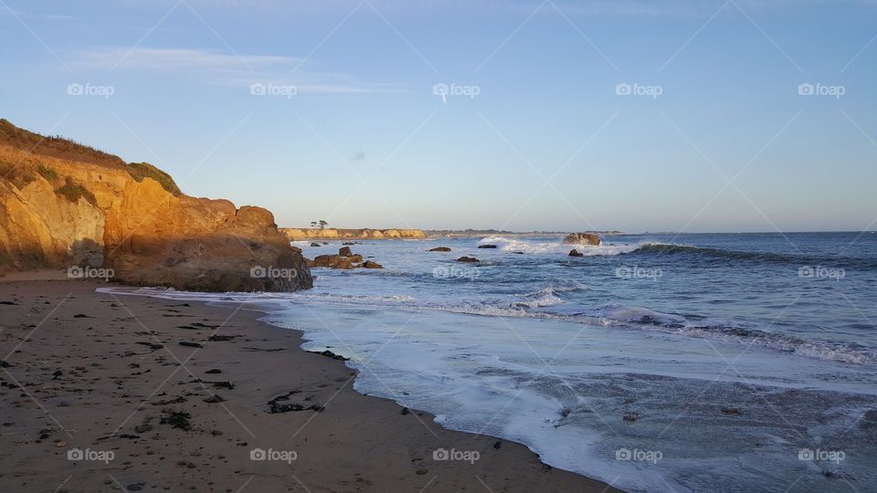 Tide coming in and breaking up on the coast of Pescadero. Just after dawn.