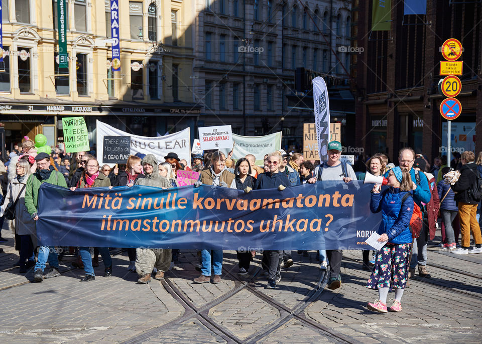 Helsinki, Finland - April 6, 2019: March and demonstration against climate change (Ilmastomarssi) in downtown Helsinki, Finland attended by more than 10000 people. 