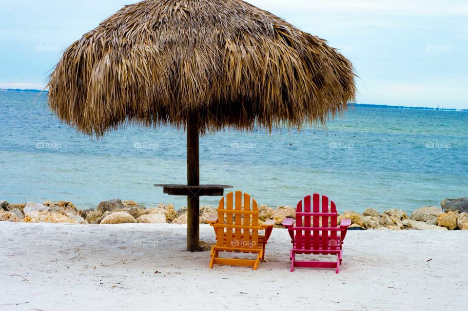 Tatched roof and chair on beach