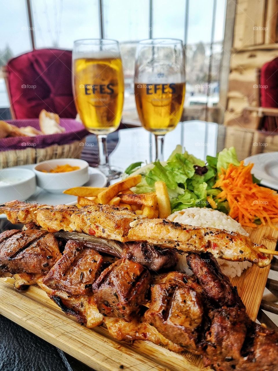 mixed kebap dish and beer