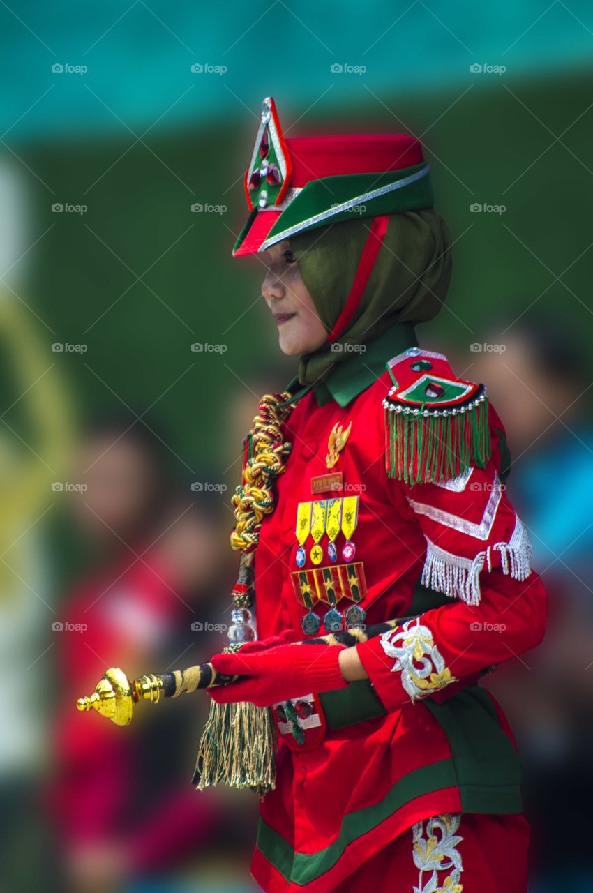 Portrait of woman in royal red uniform