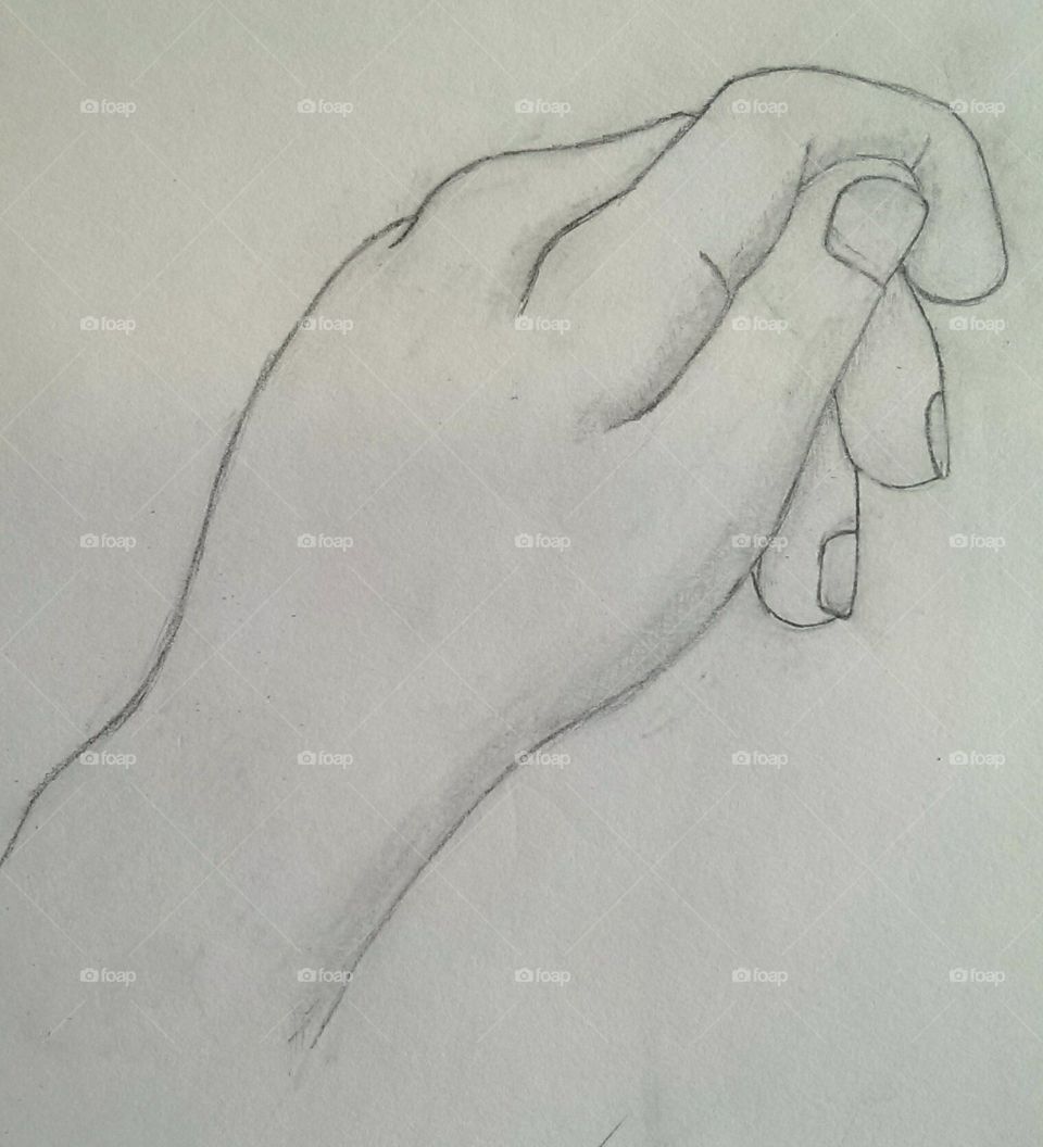 Sketch of a hand drawn in pencil.