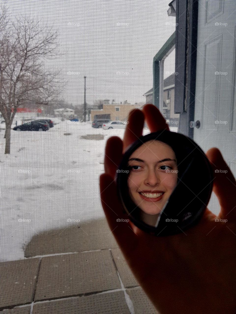 Selfie through a broken mirror