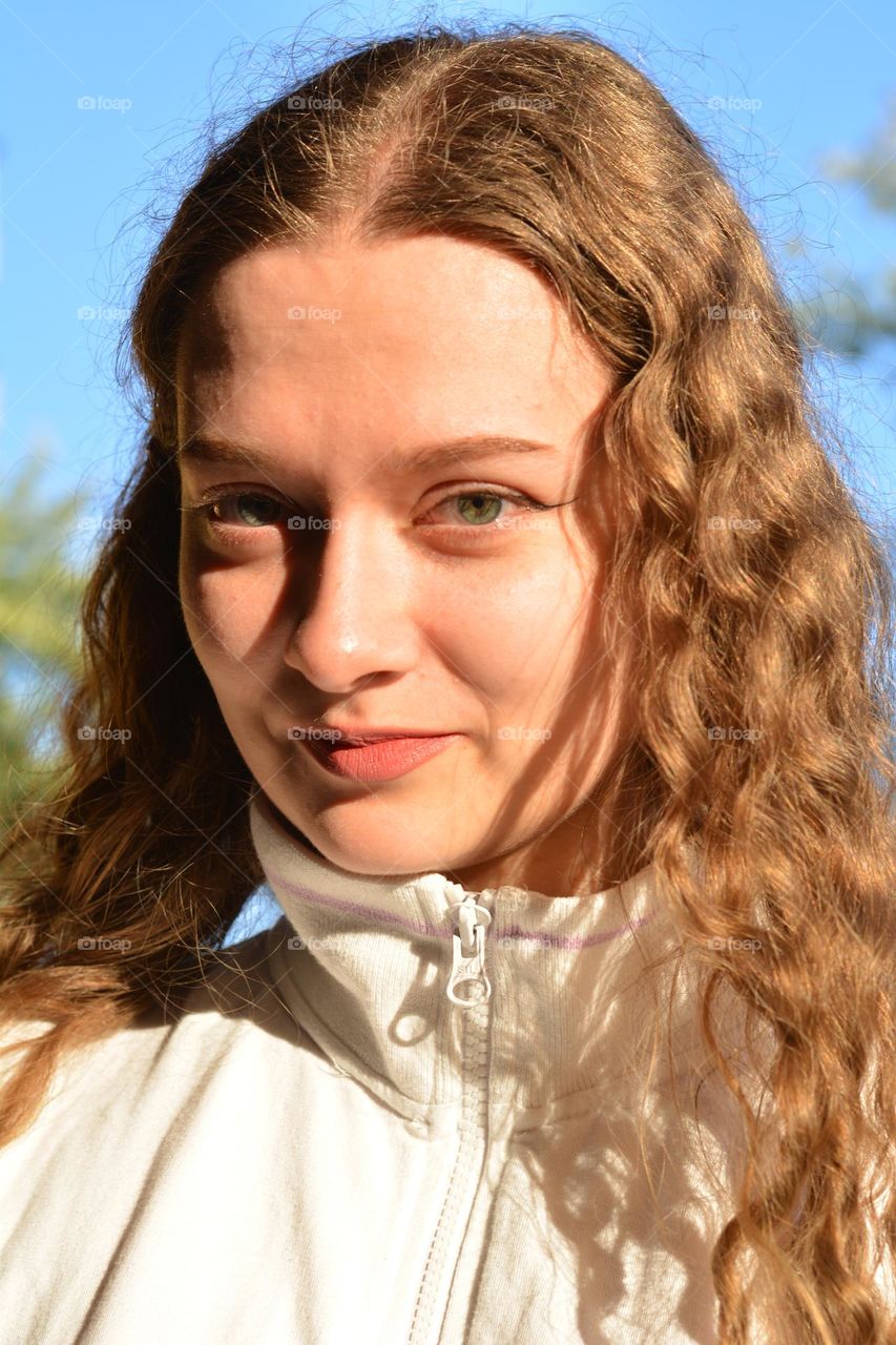 young girl beautiful portrait in sunlight