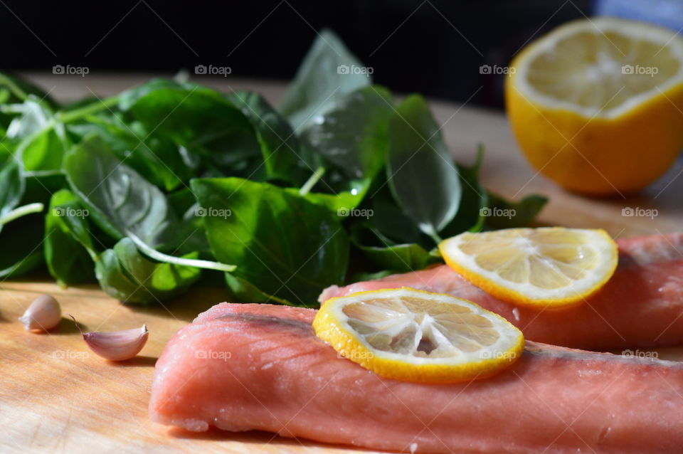 Ingredients for a delicious dinner of salmon and spinach