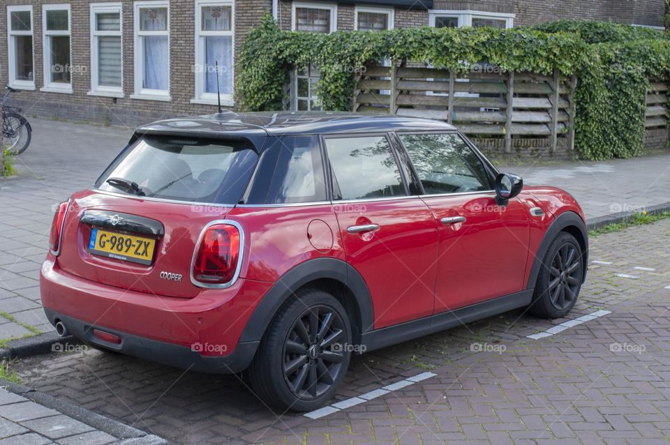 Red Mini Cooper Car At Amsterdam The Netherlands 19-6-2024