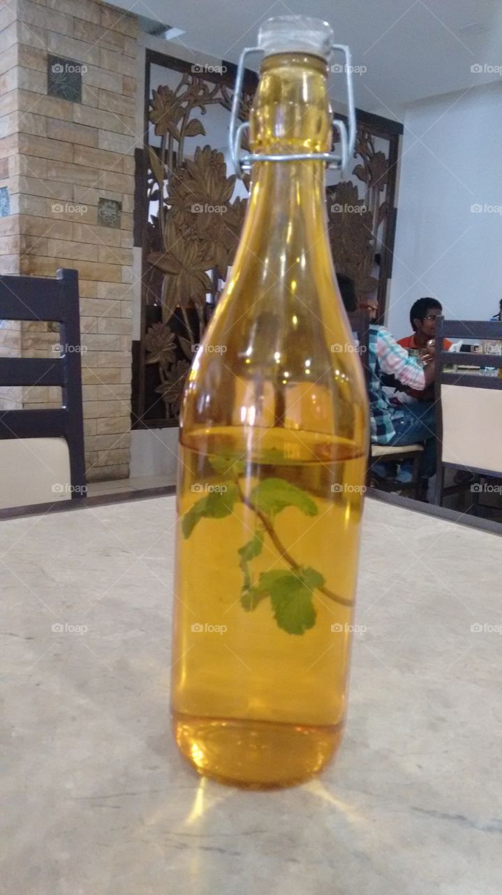 Ocimum water in Yellow color bottle
