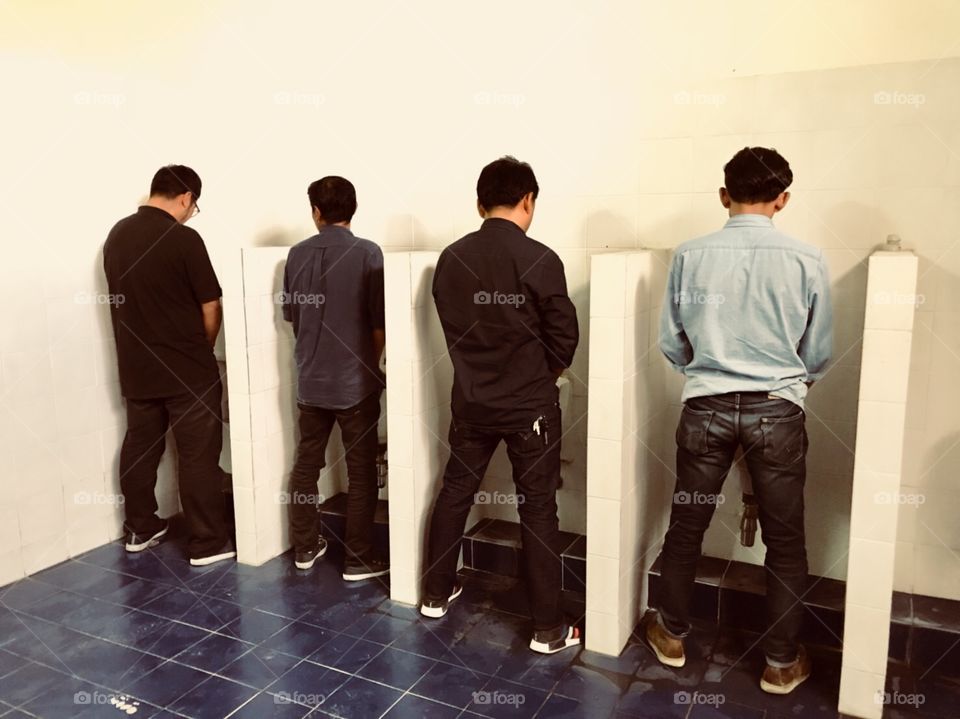 urinate together