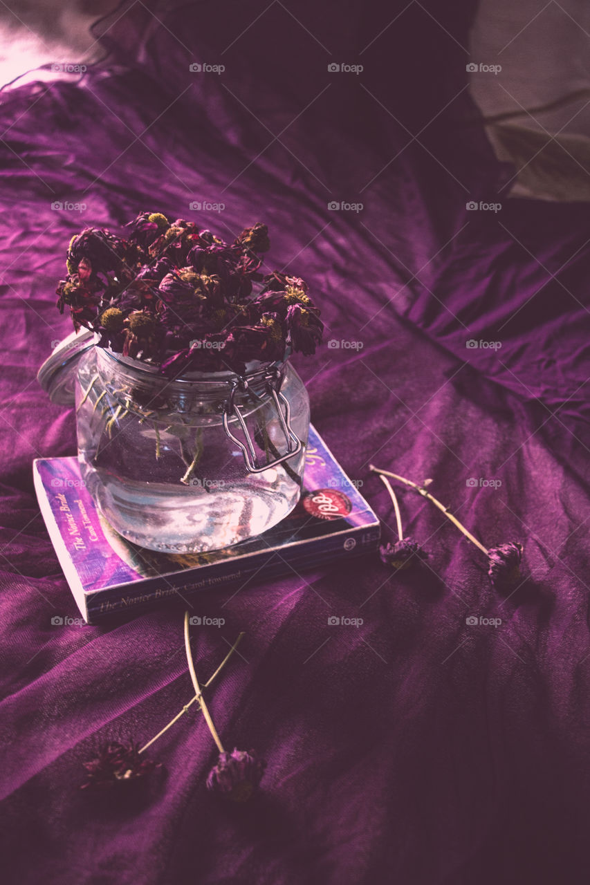 I won't be perfect without a book, a vase and some flowers