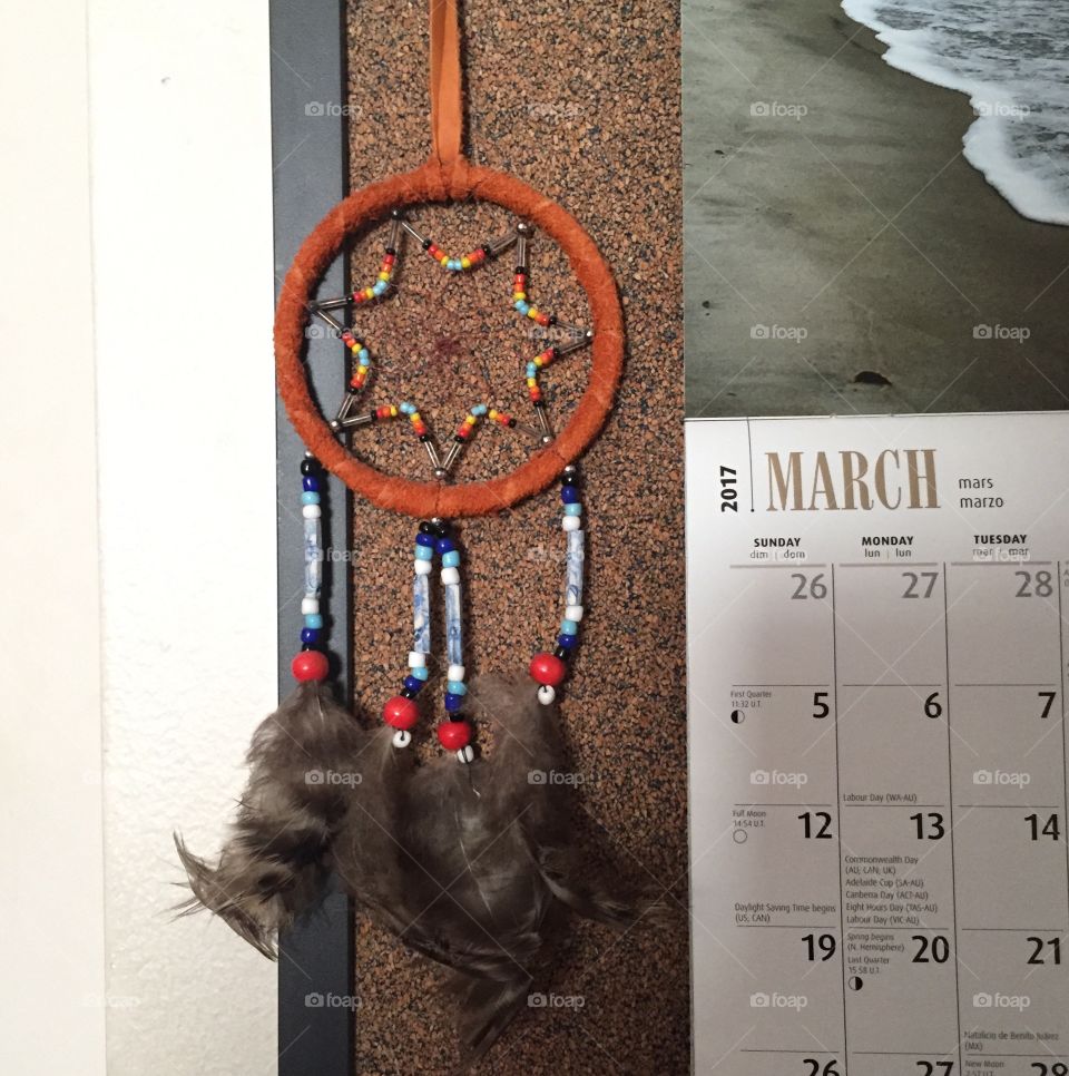 March calendar and a dreamcatcher