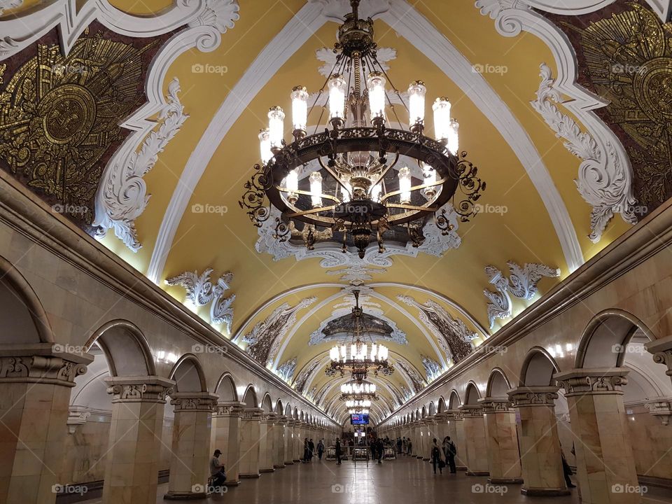 Majestic interior of a beautiful metro station with chandeliers