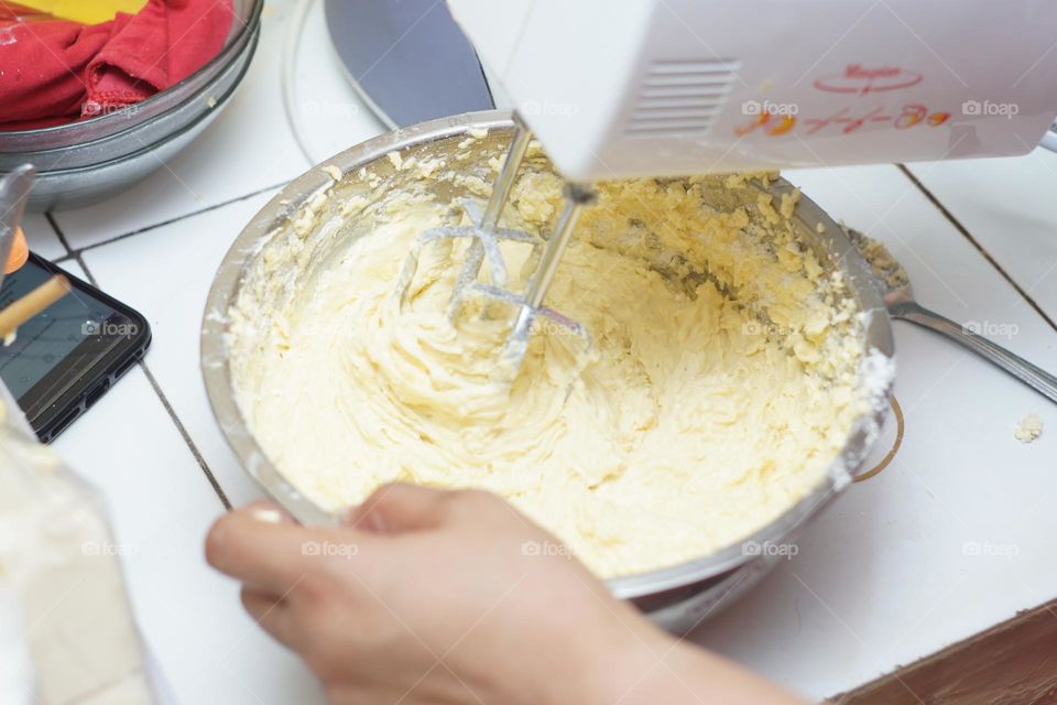 softening the dough using a mixer is one of the processes of making bread