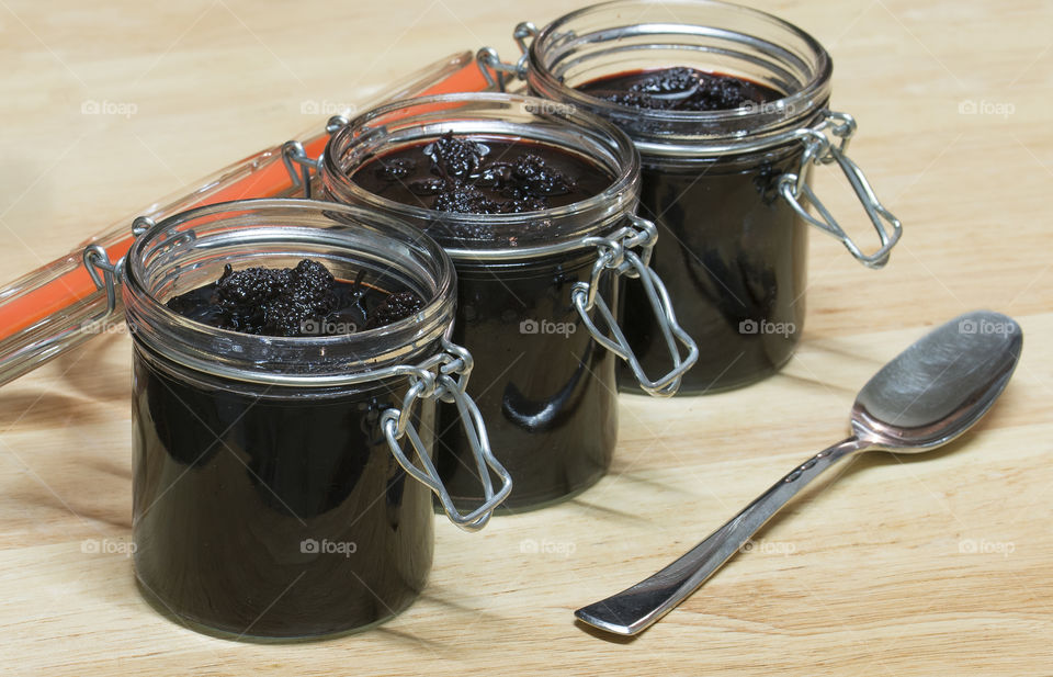 Jars of mulberries in syrup