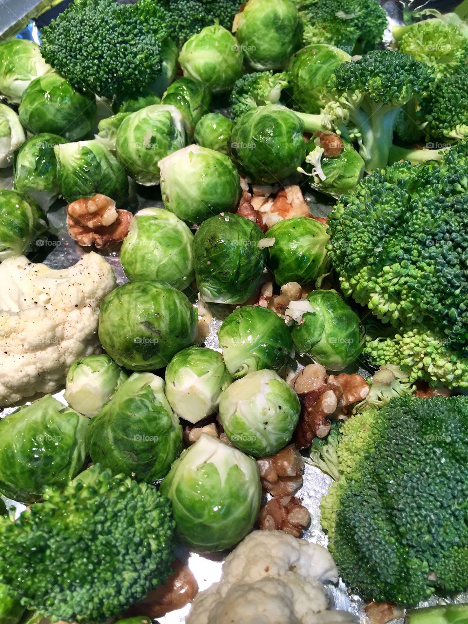 A selection of healthy vegetables ready to go into the oven for roasting.