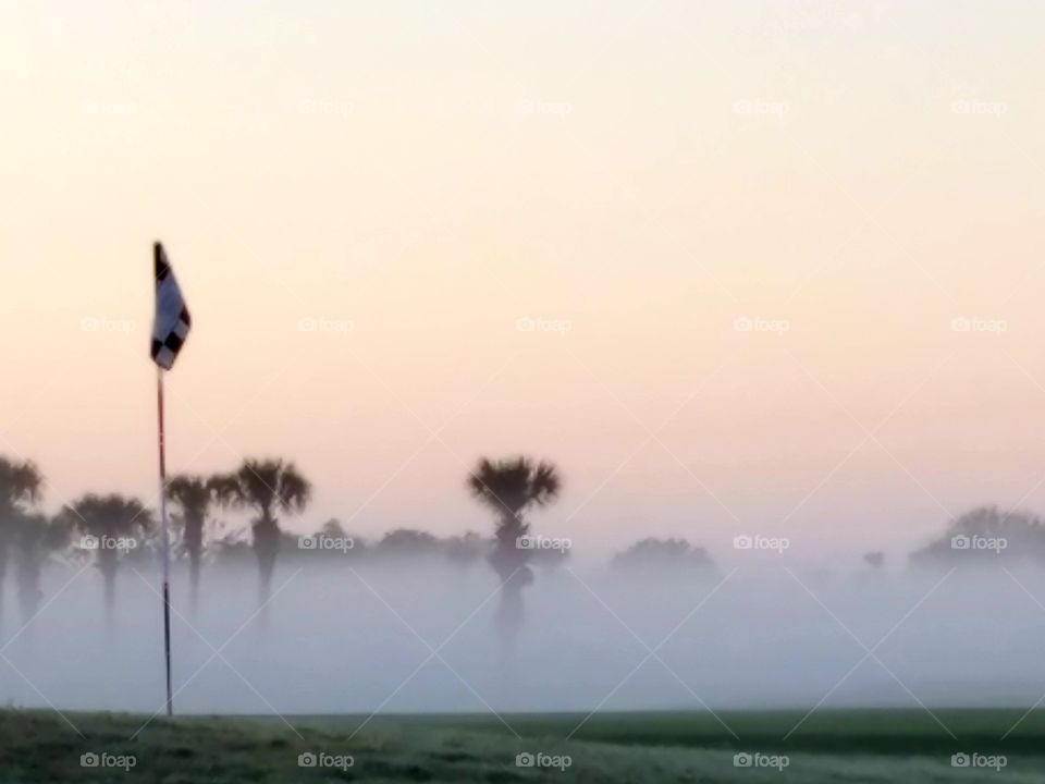 foggy morning golf hole
