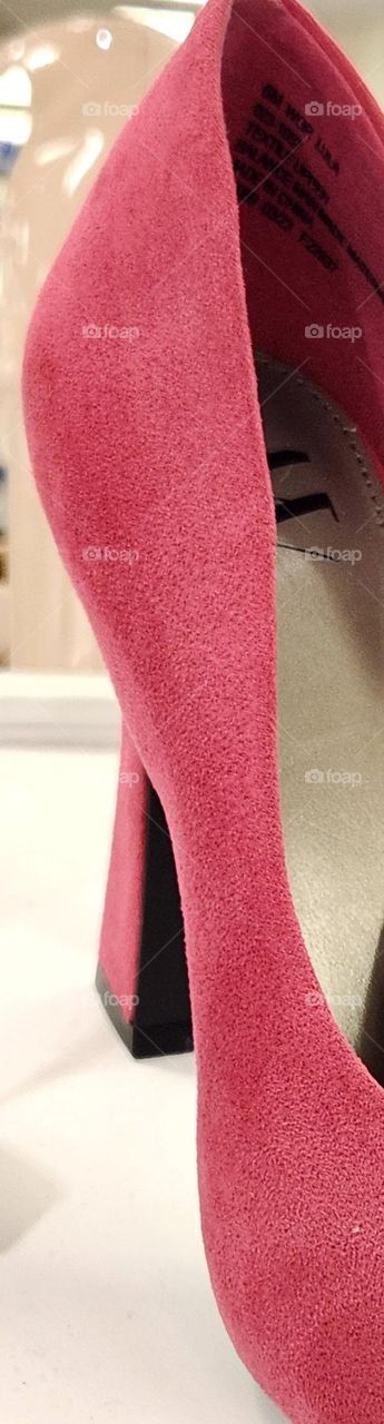 close up of a barbie style pink high heel shoe in a mall department store in Oregon