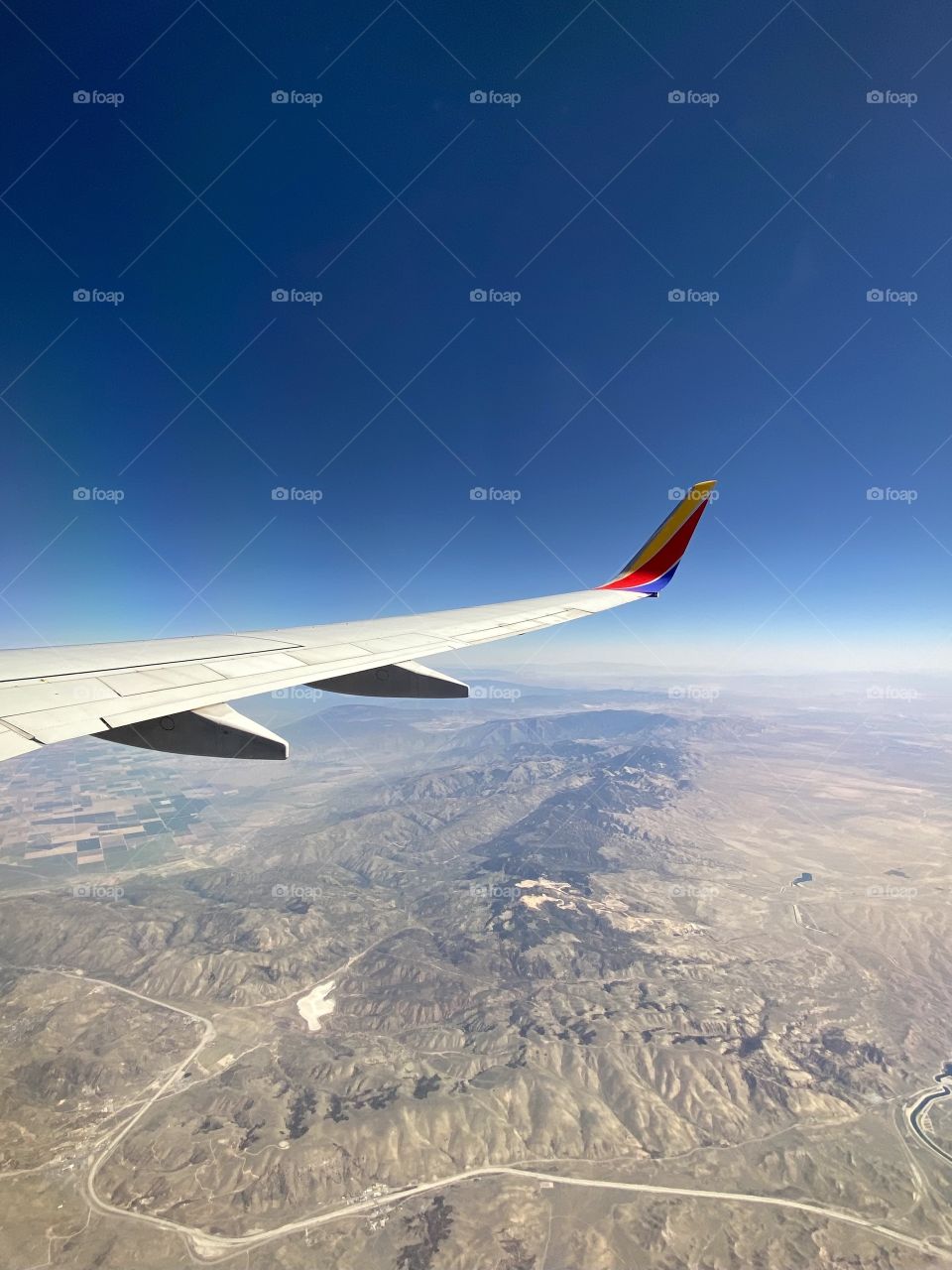 Southwest Airlines Boeing 737 flying over Kern County in California after taking off from Hollywood Burbank Airport (BUR)