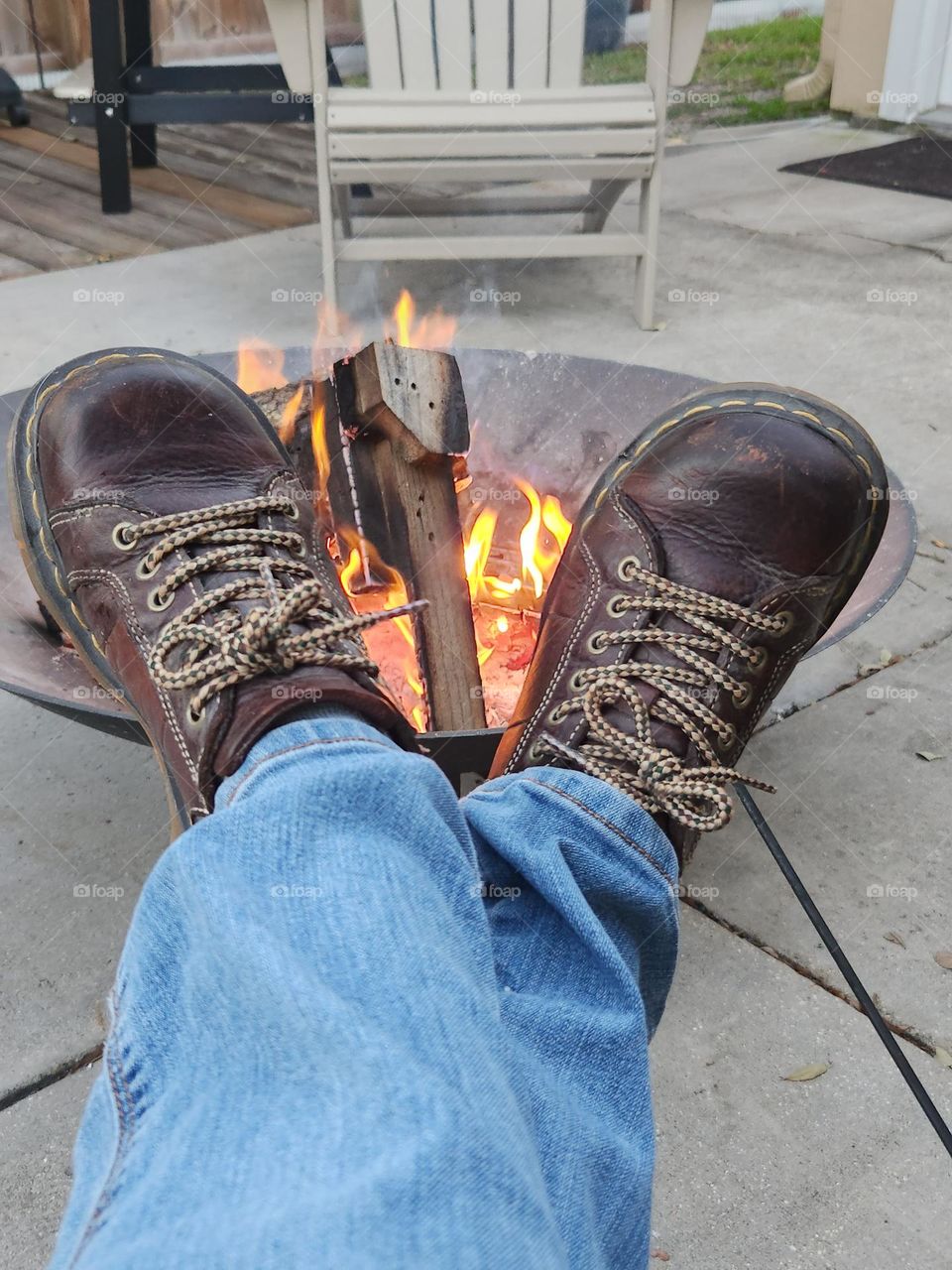 Lounging outside by the fire pit in my Docs