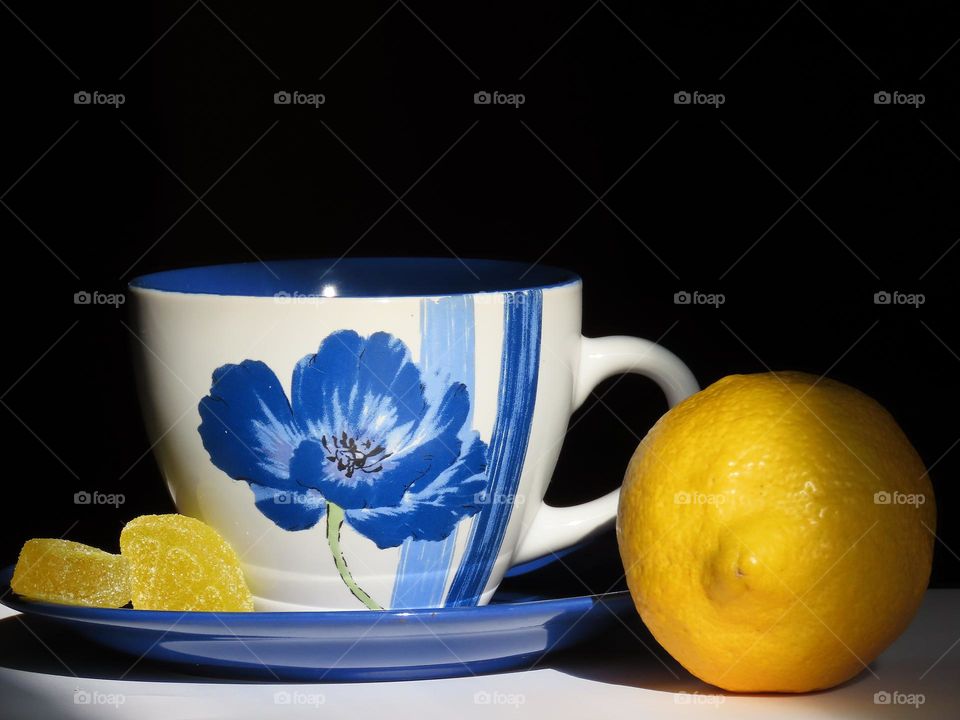 A cup of tea with lemon